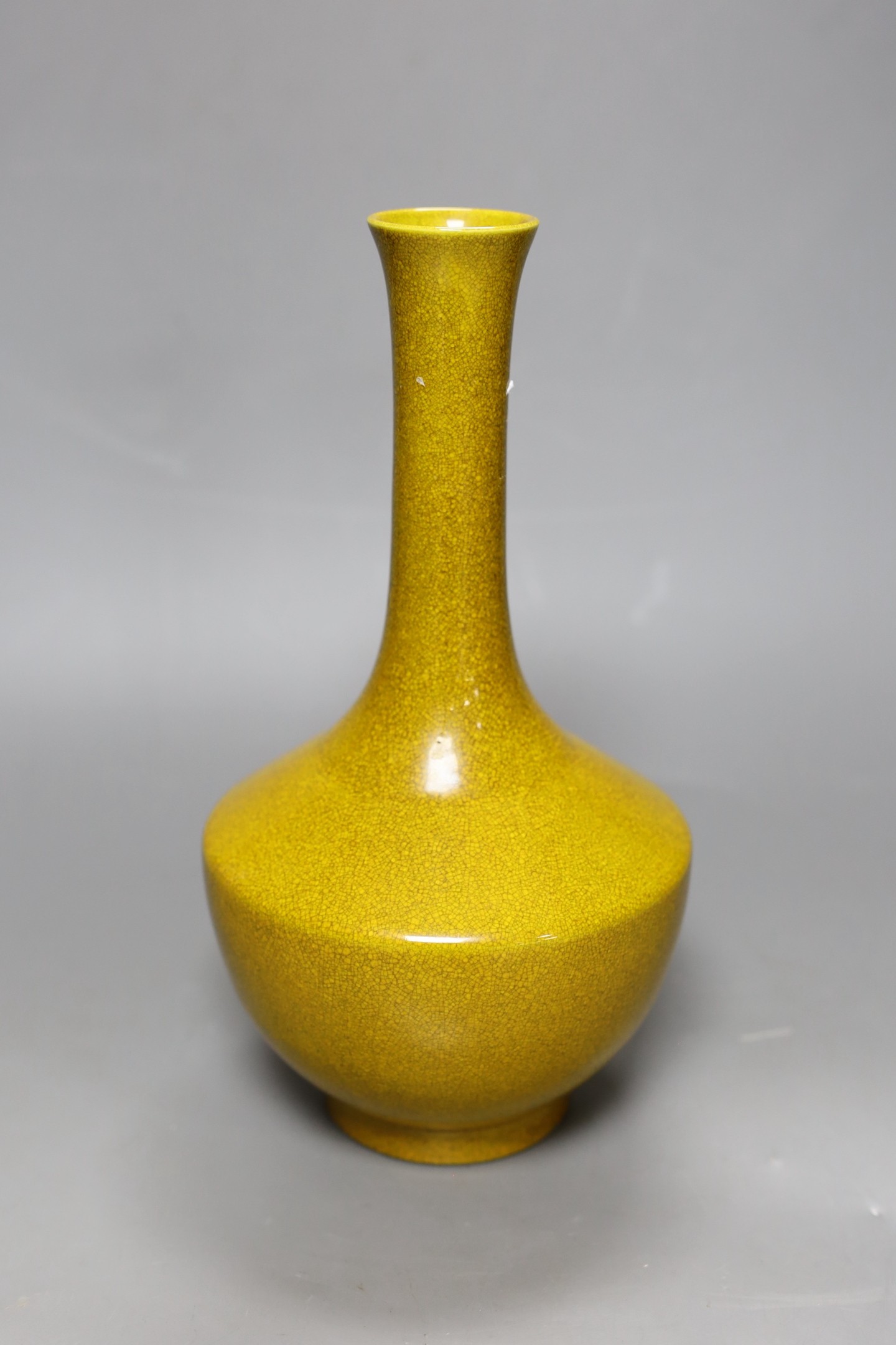 A Chinese yellow crackle glaze bottle vase, 26cm